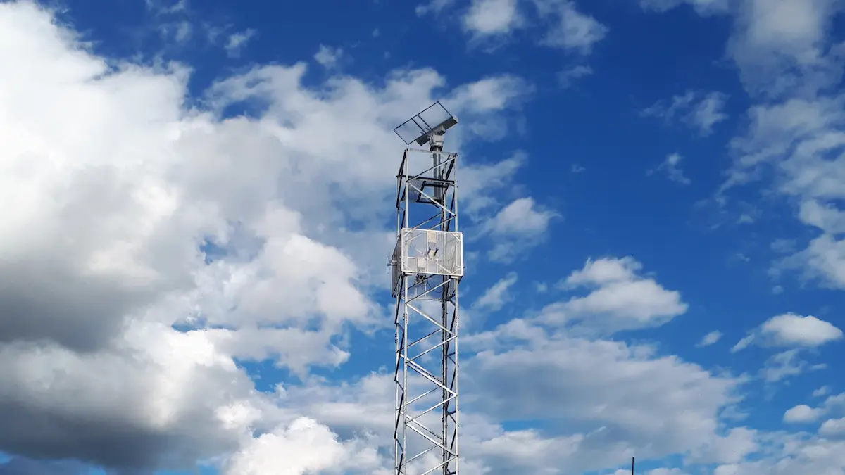Selerys EVEARLYS lightning detection interferometer mounted on a monitoring tower against a cloudy sky