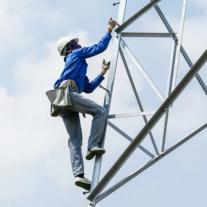 Selerys technician climbing a SKYDETECT radar tower during installation of a cloud seeding and storm warning weather sensor network