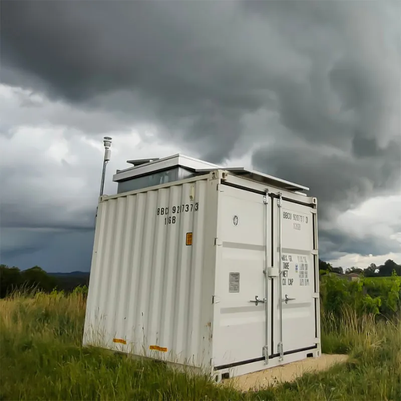 SOBLI balloon launcher by SELERYS in an open field under storm clouds